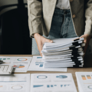 Tax attorney reviewing SARS final demand letters and verifying authenticity.