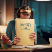 Worried woman reviewing papers about under-declaring income and tax compliance.