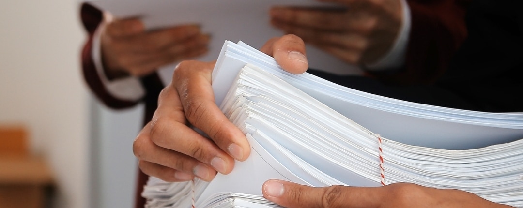 Trustees who meet to review compliance and tax obligations for their trust