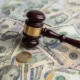 lawyer gavel on dollar notes